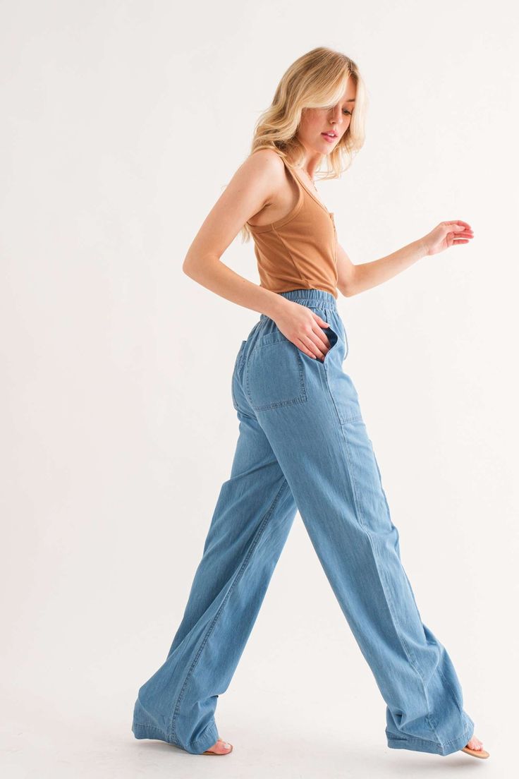 Feeling Alive chambray pants help you breeze through the day in comfort and style. Crafted from lightweight denim that's stone washed for a relaxed look, these front-pocket pants have an elastic waist and no back pockets for an easy fit. The front seam detail adds just enough visual interest, so you look put together without sacrificing comfort. Pair these easy pants with sneakers for the perfect stay-at-home-but-get-things-done outfit. 95% Cotton, 5% Polyester Want to view this on the *Live* Si Everyday Spring High Rise Cargo Jeans, High Rise Cargo Jeans For Everyday Spring Wear, Everyday High Rise Cargo Jeans For Spring, Mid-rise Pants For Everyday Spring Wear, Medium Wash Cargo Jeans For Everyday In Spring, Everyday Medium Wash Cargo Jeans For Spring, Versatile Denim Blue Bottoms For Everyday, Versatile Denim Flare Jeans With Pockets, Medium Wash Mid-rise Bottoms For Everyday