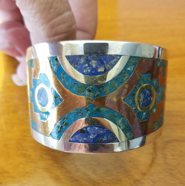 Beautiful Piece Of Work, With Turquoise, Brass And Blue Stone. Modern Blue Multi-stone Jewelry, Blue Bangle With Polished Finish, Blue Multi-stone Bangle, Blue Multi-stone Bangle Jewelry, Blue Inlay Bracelet, Blue Inlay Bracelet Jewelry, Blue Modernist Jewelry With Polished Finish, Modernist Blue Jewelry With Polished Finish, Formal Blue Inlay Jewelry