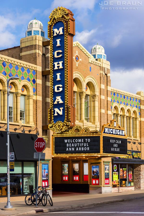 an old theater building with the word michigan on it's marquee