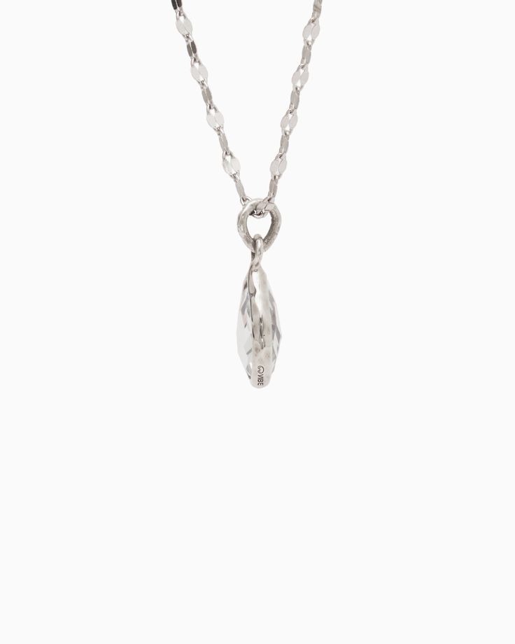 The Dewdrop Stone Pendant boasts a distinctively timeless design, featuring a pear-shaped white topaz stone cradled in sterling silver. Whether worn on its own for understated elegance or paired with a pair of Dewdrop Stone Earrings for a coordinated look, this pendant adds a touch of sophistication to any outfit. Pair with your favorite chain, sold separately. Metal: Sterling silver Stone: White topaz Dimensions: 20mm x 10mm Style #: P195W Timeless Teardrop Drop Necklace For Formal Occasions, Modern Teardrop Necklace For Anniversary, Everyday White Gold Teardrop Jewelry, Formal Teardrop Drop Necklace With Diamond Cut, Teardrop Diamond Cut Diamond White Jewelry, Diamond Cut Diamond White Teardrop Jewelry, Silver Teardrop Pendant Necklace For Formal Occasions, Timeless Silver Pear-shaped Necklace, Silver Jewelry With Single Diamond And White Topaz