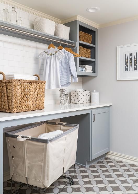 the laundry room is clean and ready to be used as a storage area for clothes