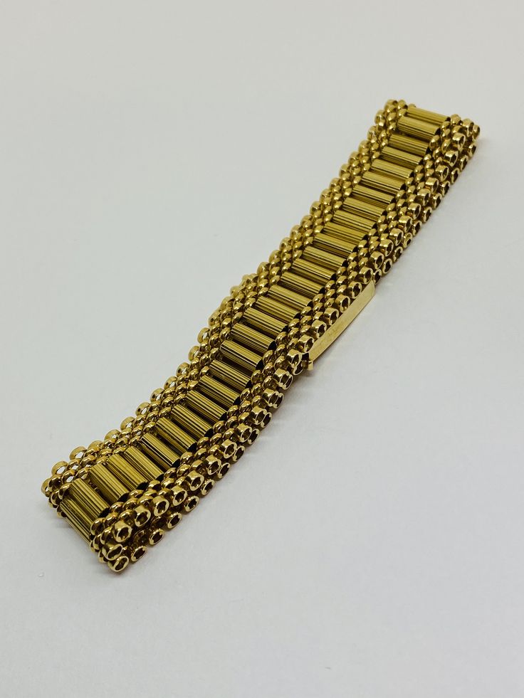 "This is a beautiful, vintage 14K yellow gold bracelet. Material(s) 14K yellow gold Measurements: This bracelet measures 7 inches in length and 14.3 millimeters in width. Weight: 24.6 grams Markings: \"14K\" If you have any questions about this bracelet, please do not hesitate to contact us! ♥" Antique Gold Bracelet Stamped 14k, Antique 14k Stamped Gold Bracelet, Classic Gold Band Bracelet, Vintage Yellow Gold Bracelets Stamped 14k, Gold Jubilee Bracelet Band, Vintage Yellow Gold Chain Bracelet With Rectangular Links, Vintage 14k Gold Bracelets, Heirloom Gold Bracelet Stamped 14k, Antique Gold Jubilee Bracelet Bangle