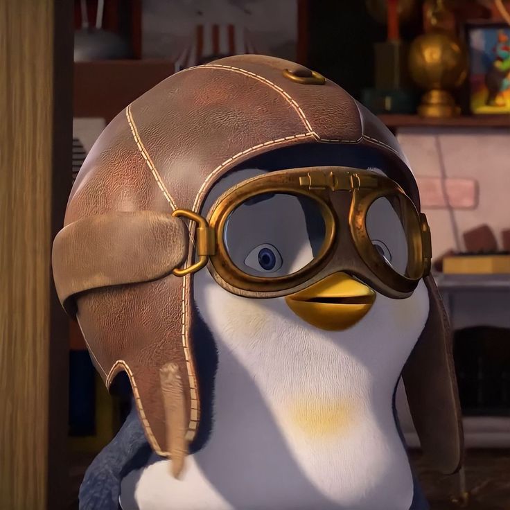 a penguin wearing a pilot's helmet and goggles in the angry birds movie