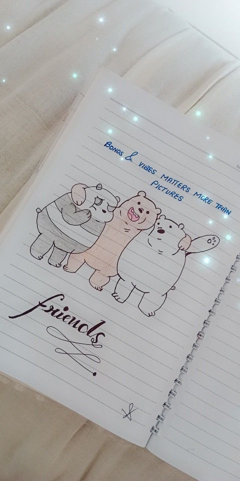 an open notebook with two bears on it and the words friends written in cursive writing