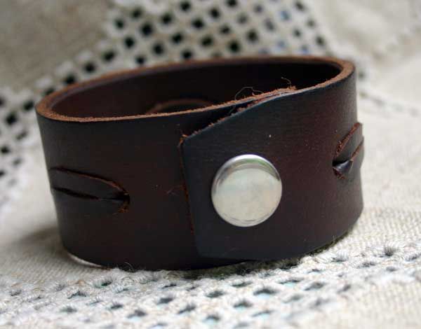 This cuff bracelet is a perfect gift for Dads.However the design is UNISEX and can be worn by both men and women. Size: 10" by 1-1/2", thickness 3/8" or 4mmMaterial: natural thick distressed Italian leather and snap closure.Snap closure.Color: Brown Leather is distressed for a vintage look and may have some natural scratches. Adjustable Brown Classic Cuff Bracelet, Adjustable Classic Brown Cuff Bracelet, Adjustable Brown Leather Bracelet Gift, Adjustable Vintage Brown Leather Bracelet As Gift, Adjustable Vintage Brown Leather Bracelet Gift, Adjustable Vintage Brown Leather Bracelet, Adjustable Brown Cuff Bracelet For Everyday, Distressed Brown Leather Bracelet Gift, Classic Handmade Adjustable Leather Bracelet