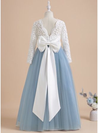 a blue and white flower girl dress with long sleeves