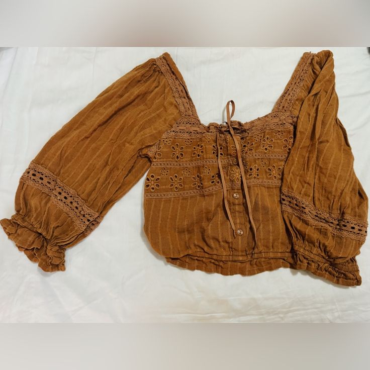 American Eagle Long Sleeve Blouse Top - Tan/Brown - Size Medium - Never Worn New Condition Brown Long Sleeve Peasant Top For Fall, Brown Long Sleeve Bohemian Blouse, Brown Fall Blouse For Day Out, Bohemian Long Sleeve Brown Blouse, Bohemian Brown Long Sleeve Blouse, Brown Blouse For Day Out In Fall, Brown Blouse For Fall Day Out, Fitted Brown Cotton Blouse, Casual Long Sleeve Brown Peasant Top