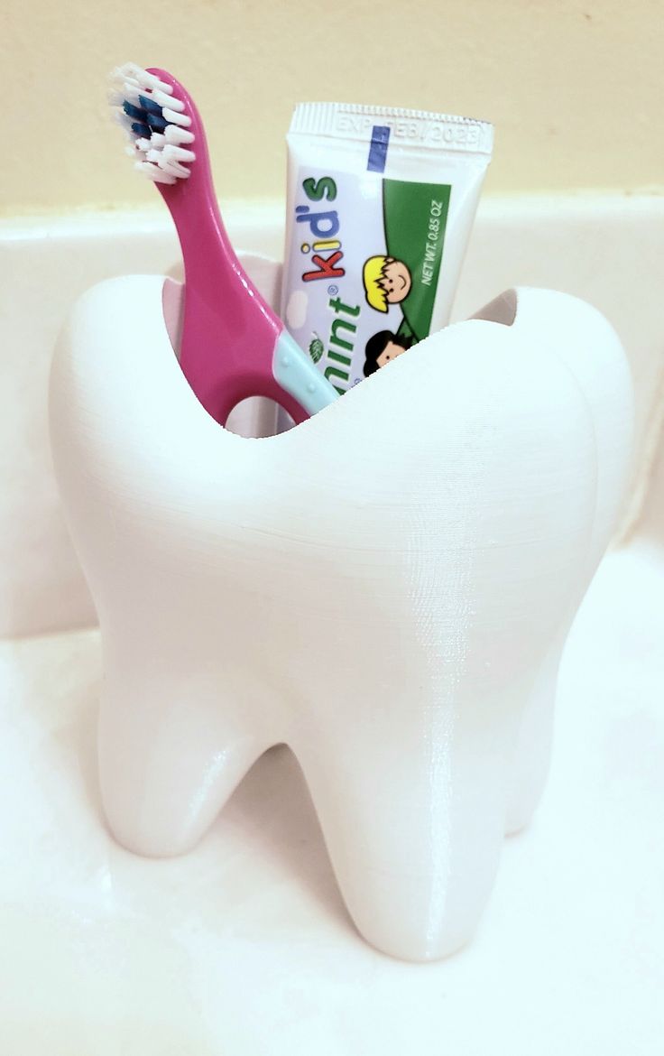 A fun addition to any kids or fun-loving adult's bathroom! Holds both children's and adult's toothbrushes with toothpaste. Drain hole allows any water to drain out keeping base dry and mildew free. This holder is 3D printed using high quality, food safe, durable PETG plastic that is as much as 10x stronger than most other 3D prints that use PLA. Buyer will receive toothbrush holder alone. Toothbrush and toothpaste only for photo demonstration purposes. Design credit: ericman93 at thingiverse.com Fun Toothbrush Holder, Development Psychology, Aperture Science, Toothbrush And Toothpaste, Toothbrush And Toothpaste Holder, Kids Teeth, Toothbrush Holders, Toothpaste Holder, Gadgets Technology