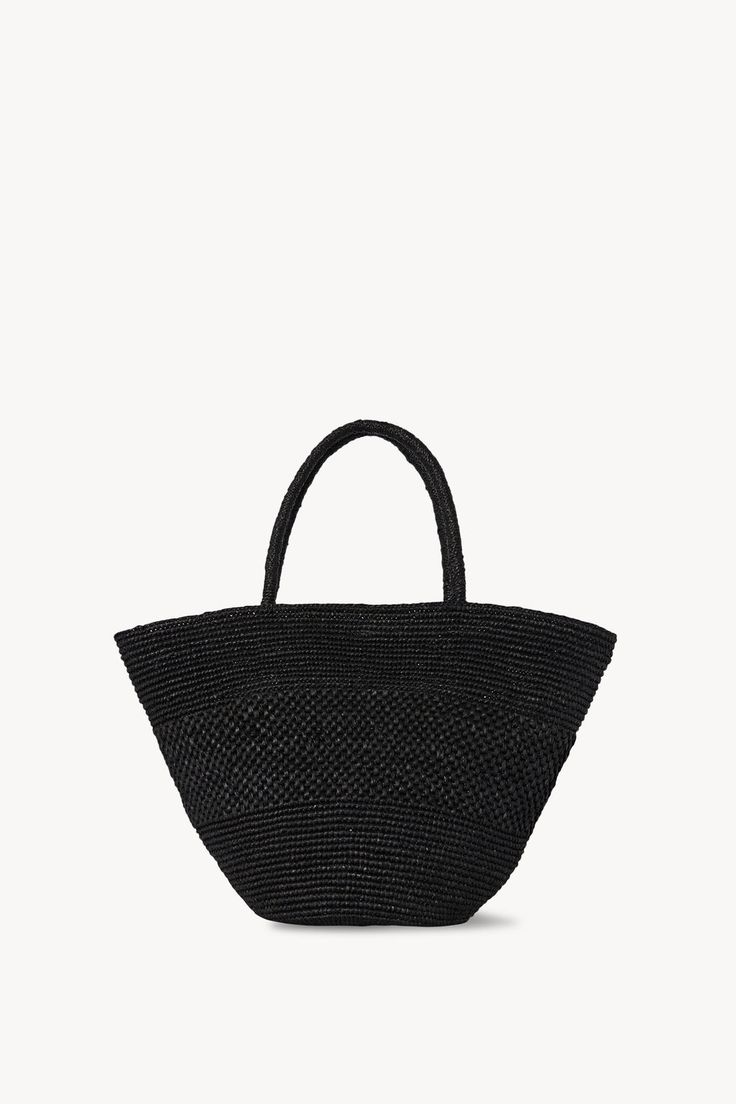 Emilie Bag Black in Raffia – The Row Chic Handwoven Jute Bag, Natural Fiber Shopping Bags, Top Handle Woven Jute Bag, Woven Straw Top Handle Bag For Shopping, Chic Beach Bag With Top Handle In Natural Fiber, Chic Jute Crochet Bag With Top Handle, Woven Jute Bag With Top Handle, Woven Jute Top Handle Bag, Top Handle Jute Bag With Woven Leather