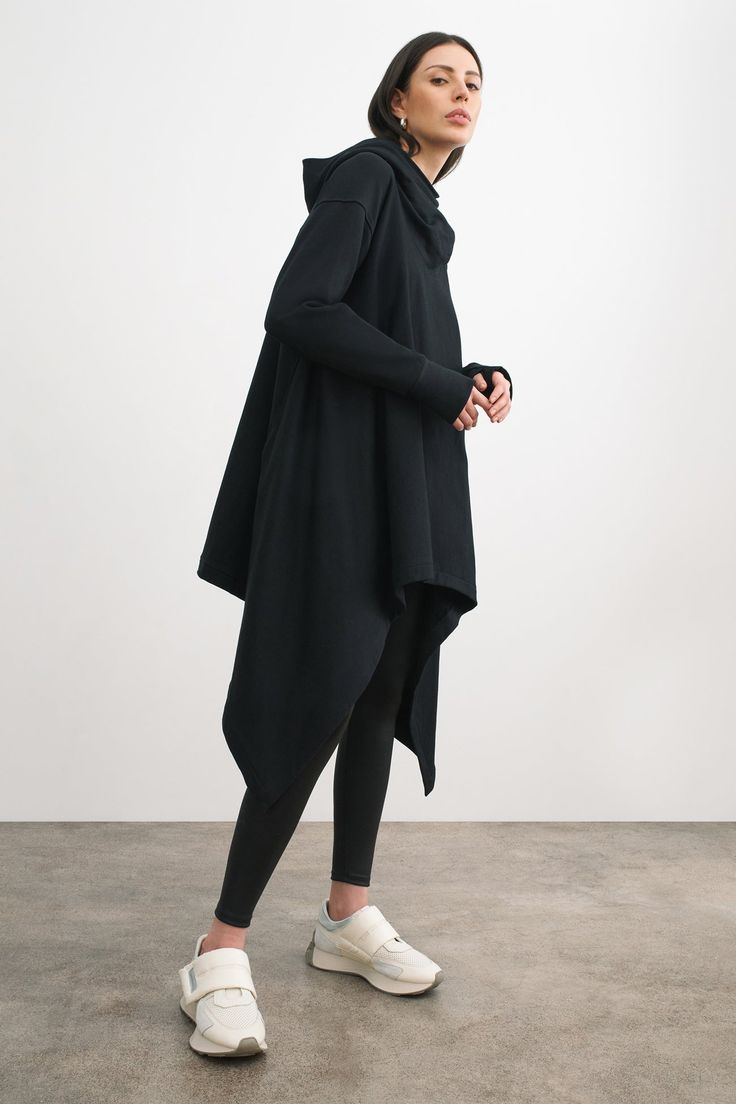 Long and flowing, our Rivington Sweatshirt Tunic is pure athleisure luxury. In our breathable midweight French Terry, she features an asymmetric silhouette and a gloriously oversized fit, with her sides cascading down to create a stunning, angular hemline. Her extra-long sleeves are finished with thumbholes, and her co Athleisure Luxury, Wardrobe Wishlist, Designer Sweatshirts, Minimalist Women, Tunic Sweatshirt, Extra Long Sleeves, Fashion Now, Hoodie Pullover, Sweatshirt Dress