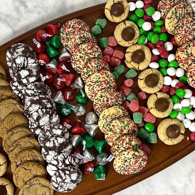 a platter filled with lots of different kinds of cookies