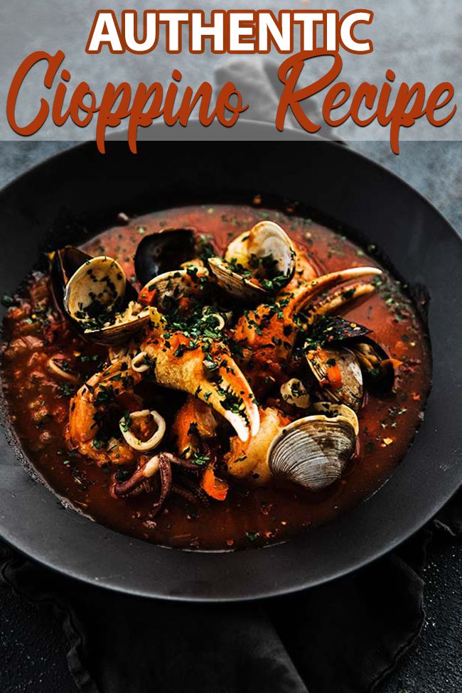 the cover of authentic cioppino recipe with clams in a black bowl