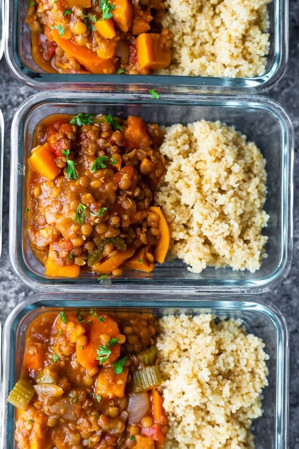 three plastic containers filled with rice and vegetables