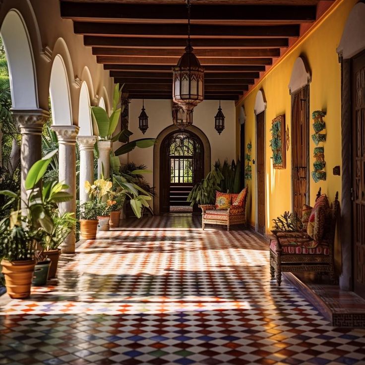 a hallway with tiled floors and potted plants