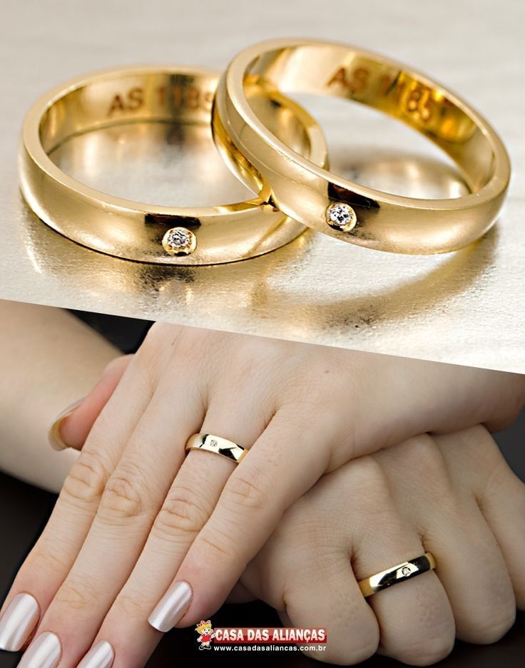 two women's hands with gold wedding rings and one woman's hand with white nails