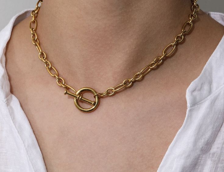 Who doesn’t love versatile? Wear this piece with the clasp in the front or back depending on your style! This stylish necklace is perfect for a simple look to wear alone or stacked with a few of our other HOJM necklaces. The quality and simplicity of it make for a necklace you never want to take off. Material: Gold Plated over Stainless Steel Base. Tarnish Free and Water Resistant Length: 16inch Allergies: Hypoallergenic Chic Everyday Toggle Link Necklace, Chic Everyday Link Toggle Necklace, Chic Toggle Necklace With Adjustable Chain For Everyday, Chic Everyday Necklaces With Toggle Clasp, Chic Everyday Toggle Necklace With Adjustable Chain, Chic Everyday Necklace With Toggle Clasp, Metal Chain Necklace For Everyday Use, Modern Chain Necklace With Lobster Clasp For Everyday, Trendy Link Toggle Necklace For Everyday