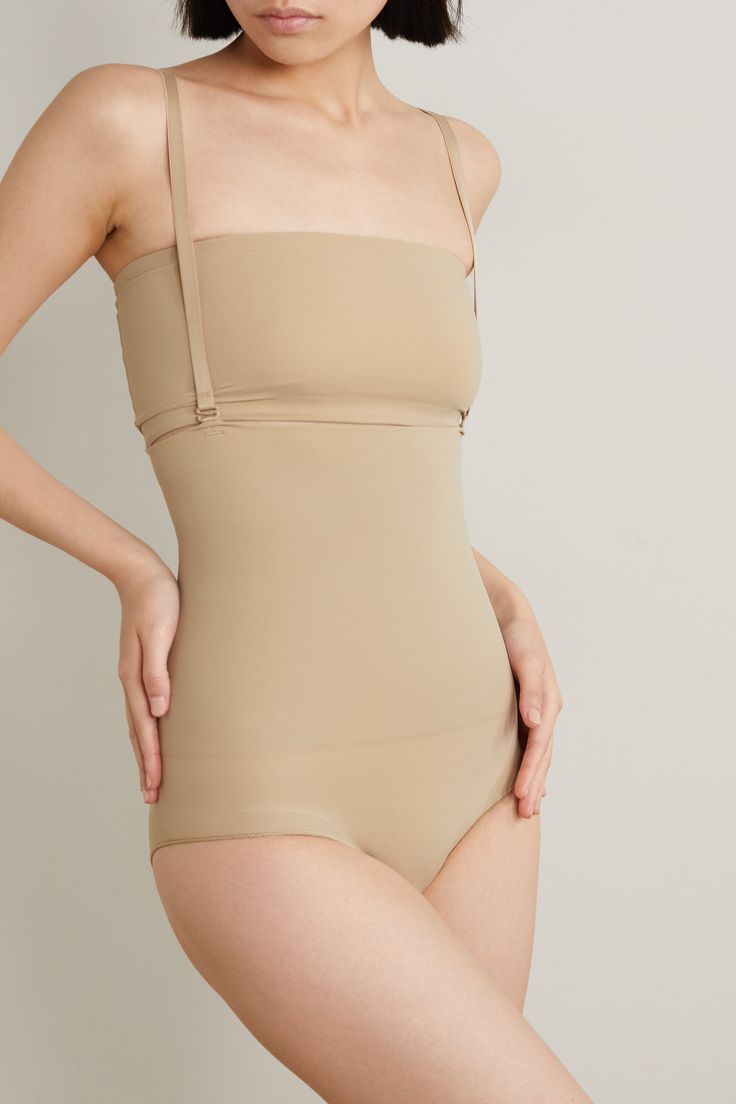 SKIMS' 'Core Control' briefs are designed with a high-rise, compressive waist that offers plenty of support and contours your figure for a naturally enhanced hourglass effect. Soft and stretchy enough for every day, they're virtually undetectable under fitted dresses and pants. Compressive Beige Shapewear With Built-in Bra, Beige Compression Shapewear With Built-in Bra, Compression Beige Shapewear With Built-in Bra, Compression Shapewear With Built-in Bra In Elastane, Compressive Shapewear Briefs With Built-in Bra, Compressive Shapewear With Built-in Bra And Brief Shape, Full Coverage Workout Bottoms, Versatile Fitted Smoothing Shapewear, Versatile Fitted Shapewear With Smoothing Details