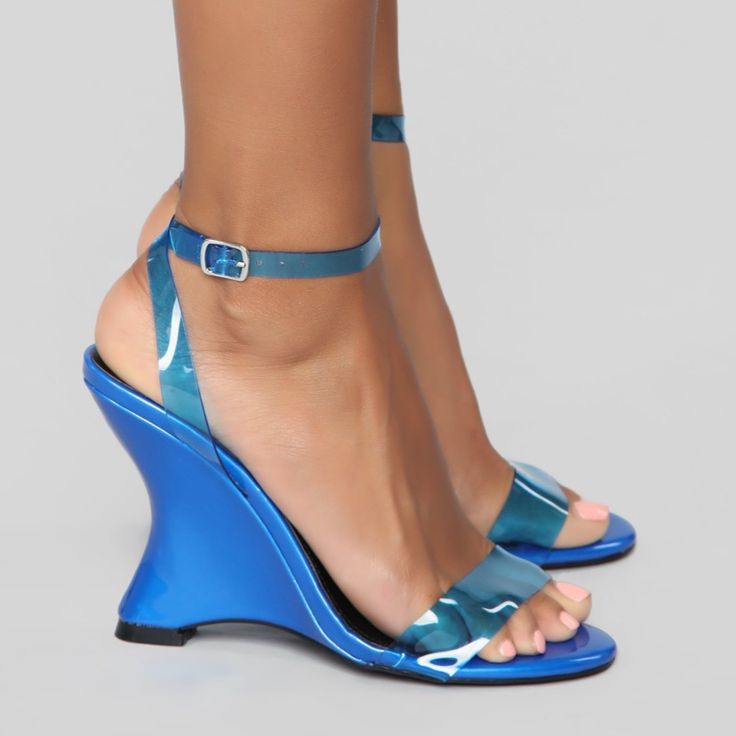 Blue 4.5 Inch Wedge Pvc Straps Blue Sandals With 4-inch Heel, Trendy Blue Sandals With 4-inch Heel, Trendy Blue Wedge Sandals With Round Toe, Blue Sandals With 4-inch Heel For Summer, Light Blue Synthetic Wedge Sandals For Summer, Trendy Blue Synthetic Wedge Sandals, Blue Wedge Sandals For Summer Party, Summer Party Blue Wedge Sandals, Blue Synthetic Sandals With 4-inch Heel