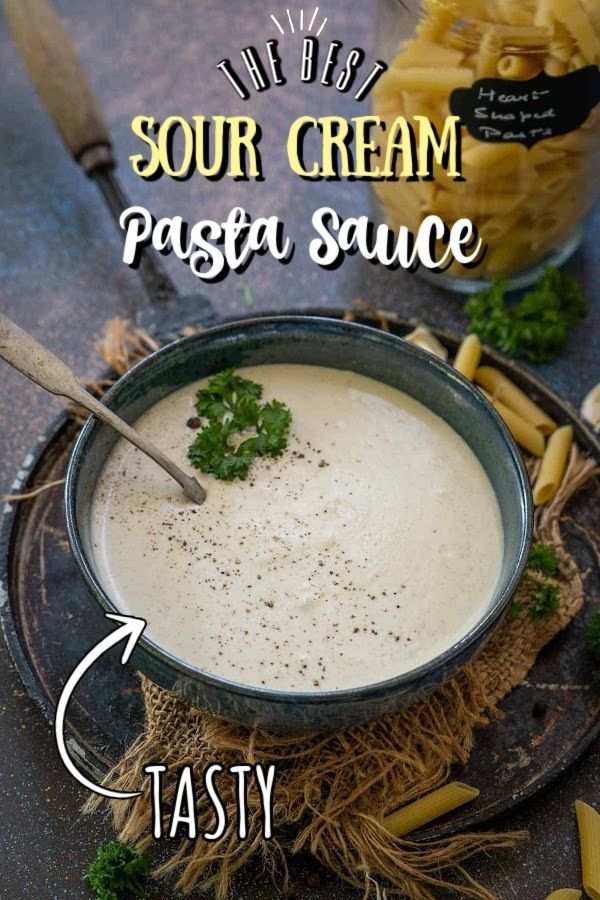 a bowl of pasta sauce with parsley on top and the words sour cream pasta sauce above it