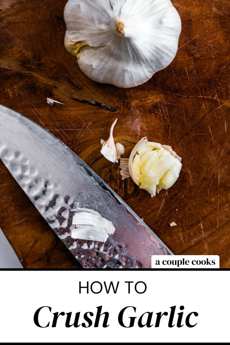 a knife and garlic on a cutting board with the title how to crush garlic