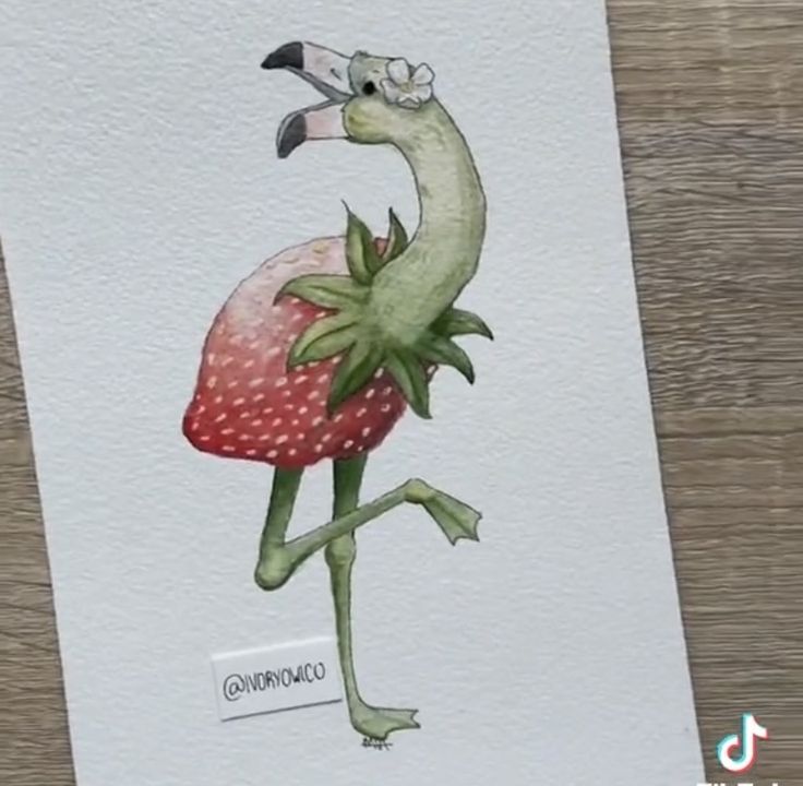 a card with an image of a frog holding a strawberry on it's back