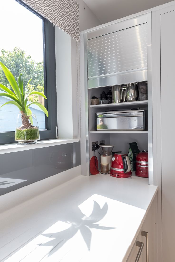 the kitchen is clean and ready to be used as a storage area for cooking utensils