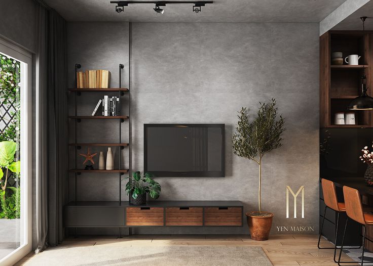 a living room filled with furniture and a flat screen tv sitting on top of a wooden shelf