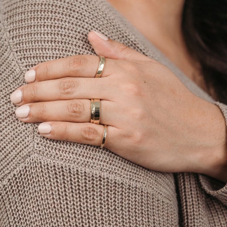 Handcrafted by our team of skilled artisans and made from 100% recycled gold, The Rosalind is a signature yellow gold stacking ring. The delicate hammered texture, inspired by the Rosalind moon, is paired with the longevity and brilliance of ethical gold. A new take on an everyday classic - this yellow gold stacking ring is the perfect staple for everyday wear and pairs effortlessly with any ring stack. Hammered Yellow Gold Ring Features: 100% recycled 10k or 14k yellow, rose or white gold ring Gold Stackable Rings In Recycled Gold, Minimalist Gold Stackable Bands, Minimalist Stackable Gold Bands, Heirloom Stackable Rings, Tarnish Resistant, Everyday Heirloom Style Tarnish Resistant Stackable Rings, Stackable Yellow Gold Engraved Ring For Everyday Wear, Stackable Yellow Gold Bands For Everyday Wear, Adjustable Yellow Gold Rings For Everyday Use, Gold Midi Rings Of Recycled Gold