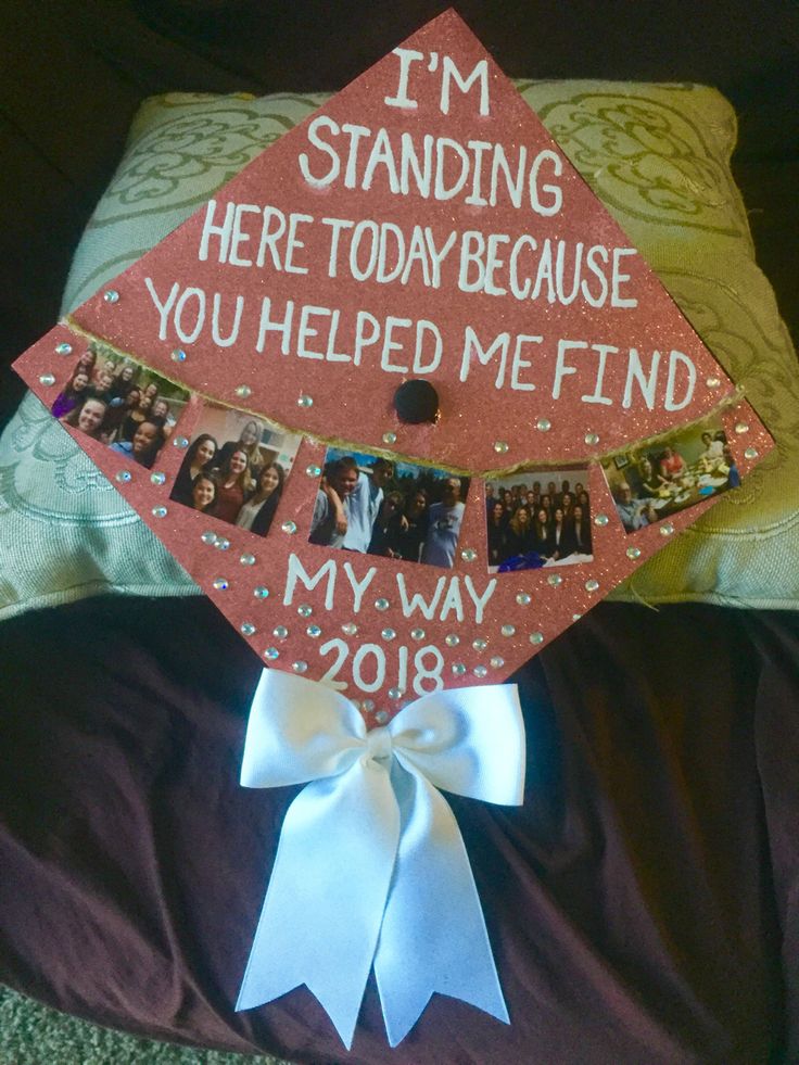 a graduation cap that has been placed on top of a pillow with the words, i'm standing here today because you helped me find my way