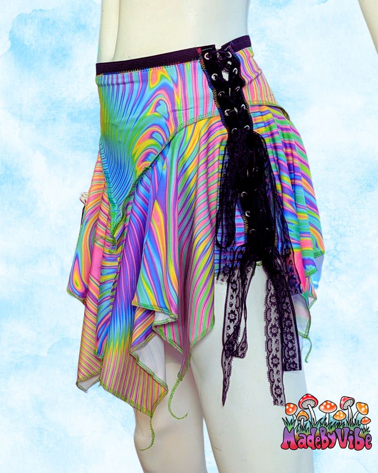 Get ready to shine in our Dark Prismatic Fairy Skirt! This playful skirt features flowing layers of rainbow fabric, an elastic waistband, and lace up sides. Comfortable and flattering, it's perfect for raves, festivals, or a summer day. Get your fairy style on and stand out from the crowd! Pattern placement may vary Ready to Ship. Festival Sewing Pattern, Fairy Skirt Pattern, Asymmetrical Skirt Pattern, Velvet Swimwear, Butterfly Skirt, Rainbow Fabric, Fairy Skirt, Sewing Tricks, Fairy Style