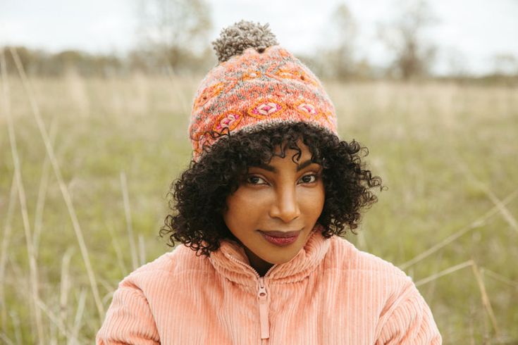 A fun pattern-filled hat made with 100% wool. This is a multicolored addition to any snow day. Fleece lined and handmade in Nepal. Playful Warm Hats For Fall, Playful Brimmed Crochet Hat For Winter, Bohemian Wool Hat For Winter, Bohemian Hats For Cold Weather And Fall, Whimsical Beanie For Fall, Whimsical Winter Beanie Hat, Whimsical Fall Beanie Hat, Whimsical Multicolor Winter Hat, Snow Day