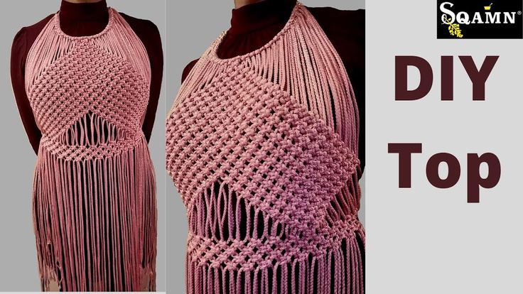 a pink crocheted dress with fringes on it