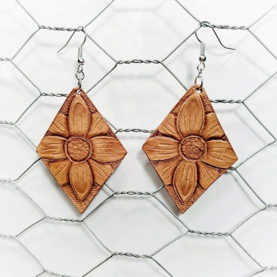 Check out this item in my Etsy shop https://www.etsy.com/listing/719915885/diamond-sunflower-tooled-leather Hand Tooled Brown Earrings For Everyday Wear, Brown Hand Tooled Everyday Earrings, Brown Flower Drop Earrings, Brown Flower Earrings With Ear Wire, Brown Flower Earrings, Everyday Brown Faux Leather Jewelry, Tooled Leather Earrings, Leather Crafting, Leather Work