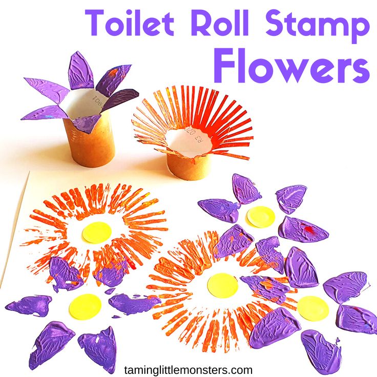 an image of toilet roll flowers made with crayon pencils and colored paper