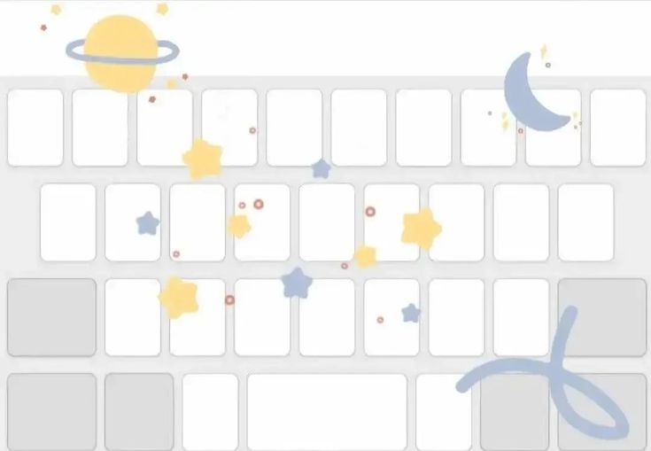 a keyboard with stars and planets on it