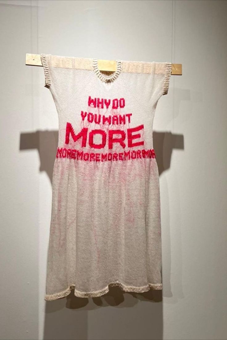 a t - shirt that says, why do you want more?