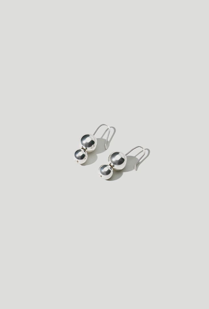 Double Orb Silver Earrings – MASLO CO. Glitter Gifts, Jewelry Care Instructions, Earring Sale, Sterling Silver Bead, Everyday Style, Silver Beads, Jewelry Care, Precious Metals, Sterling Silver Earrings