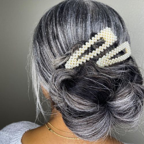 15 Hairstyle for Black Women Over 50 with Black Gray Hair Care Tips Grey Crochet Braids, Black Gray Hair, Hairstyle For Black Women, Pearl Clips, Grey Hairstyles, Pepper Hair, Long Silver Hair, Grey Hair Care, Loose French Braids