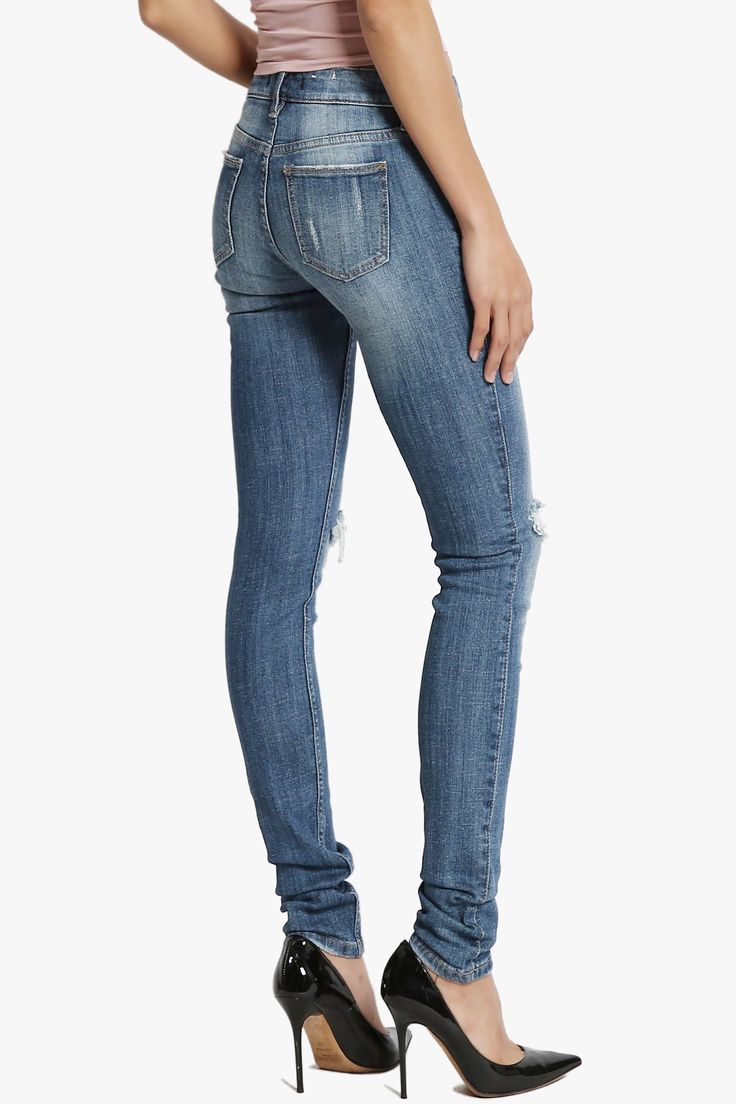 These fierce low rise skinny jeans are so on trend yet still really versatile.With rad ripped detail down each leg and in a classic vintage blue, these jeans will have you feeling fine whatever the time.Style yours with a printed cami top, heeled sandals and an oversized clutch to go for the casual cool look.Low rise, Ripped details with whiskering skinny jeansFitted, skinny legs, shape enhancementFive pocket styling, Belt loops ; Zip fly with button closureMeasured from size 5 : 29" low waist, Trendy Distressed Jean Shorts, Chic Distressed Fitted Bottoms, Edgy Ripped Fitted Jeans, Trendy Ripped Cropped Jeans, Trendy Fitted Distressed Jeans, Chic Ripped Jeans, Fitted Distressed Jeans For Summer, Trendy Fitted Ripped Bottoms, Trendy Ripped Slim Fit Jeans