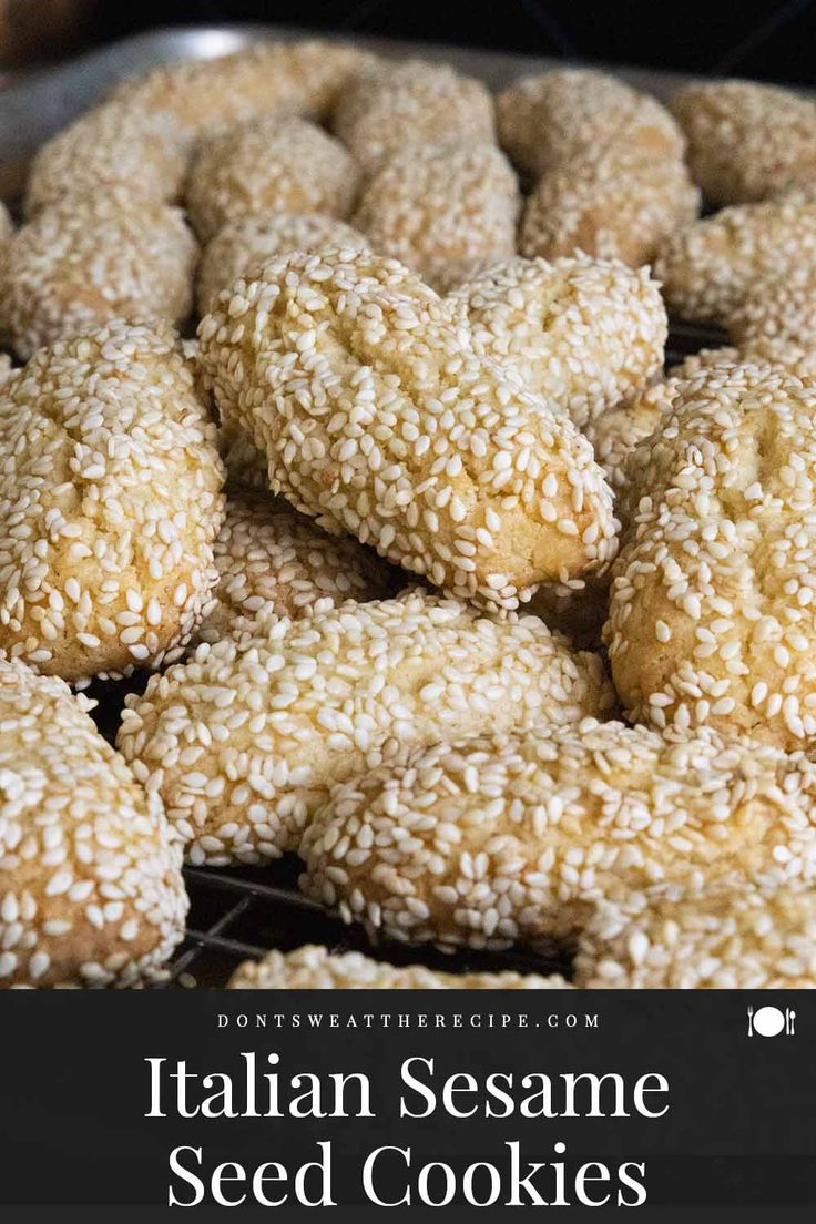 italian sesame seed cookies on a cooling rack with text overlay that reads, italian sesame seed cookies