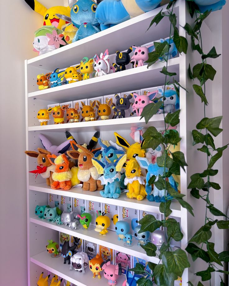 the shelves are filled with pokemon figurines on them and plants in front of them