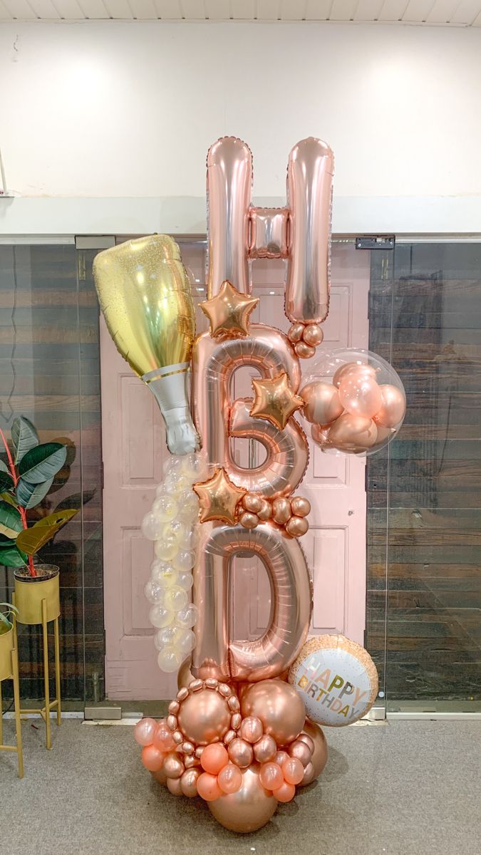 a balloon sculpture with the word b is for birthday