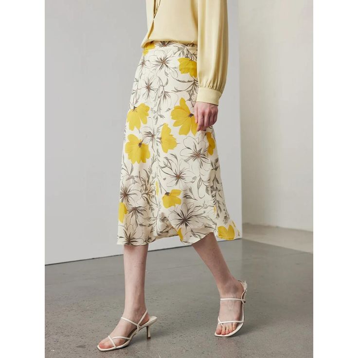 Discover Elegance and Comfort Step into the season with our Floral Silk Midi Skirt, designed exclusively for the sophisticated and modern woman. This elegant piece is perfect for office wear or special occasions, blending comfort with classic style. Made from 100% pure Mulberry silk, this skirt feels as luxurious as it looks, ensuring you stay comfortable while making a fashion statement. Key Features Our Floral Silk Midi Skirt boasts a variety of features designed to enhance your wardrobe: Material: High-quality 100% Mulberry silk Style: A-Line silhouette with a natural waistline Length: Graceful mid-calf length Pattern: Delicate floral print Decoration: Seamless zipper for a sleek look Seasonality: Ideal for Spring and Summer Size Chart Size (cm) Length Waist Hips S 76 64 90 M 77 68 94 L Elegant Summer Pencil Skirt For Day Out, Elegant Summer Wrap Skirt With Lining, Elegant Lined Skirt For Brunch, Elegant Relaxed Maxi Skirt For Brunch, Elegant Wrap Pencil Skirt For Work, Elegant Pencil Wrap Skirt For Work, Elegant Beige Lined Wrap Skirt, Elegant Relaxed Skirt For Brunch, Flowy Skirt For Workwear