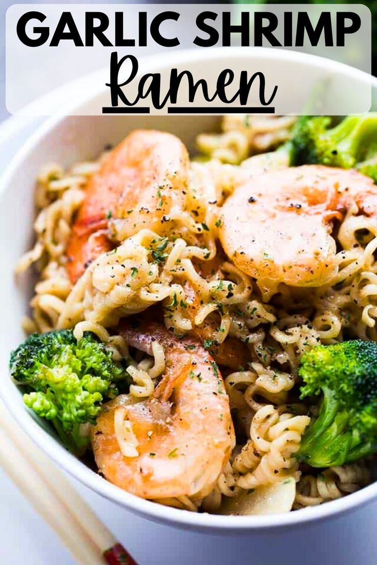 a bowl filled with shrimp, broccoli and noodles