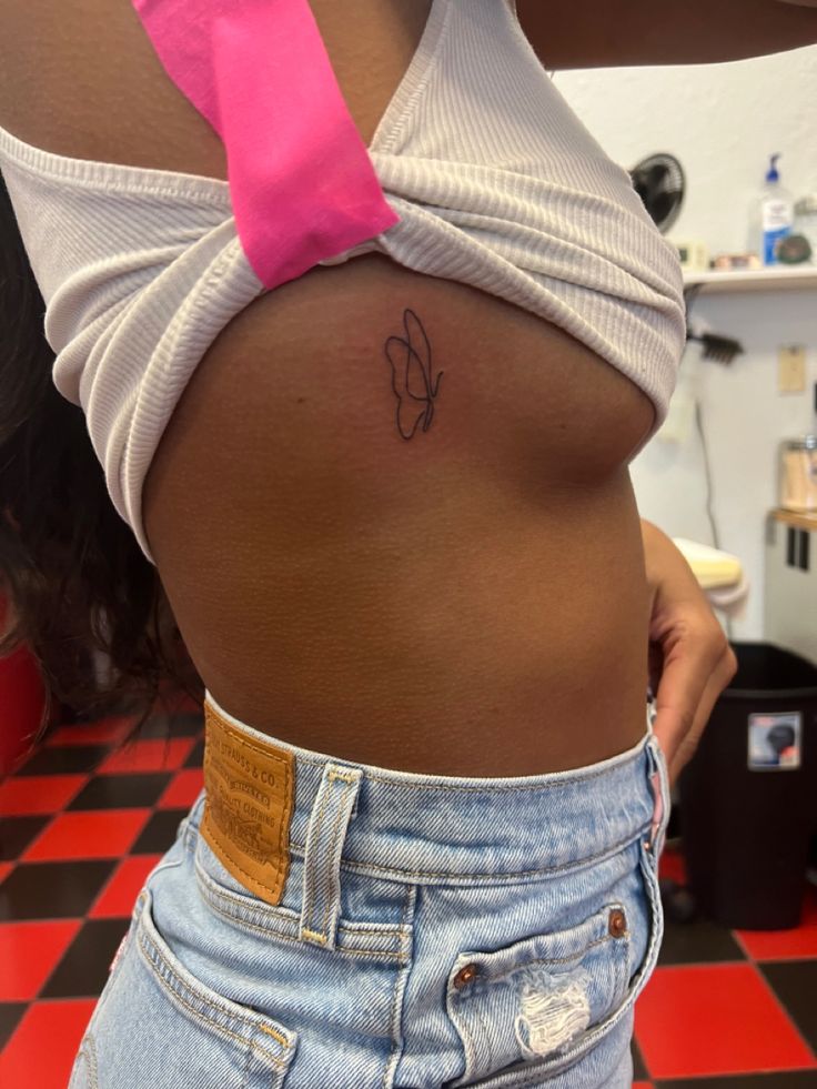 fine line butterfly tattoo Upper Torso Tattoo, Small Dainty Fine Line Tattoos, Fine Line Butterfly Tattoo Rib, Girl Tattoo Placement Ideas, Fine Line Side Tattoo, Girly Tattoo Ideas Unique, Small Hideable Tattoos, Cute Places For Small Tattoos, Arm Tattoos For Women Simple