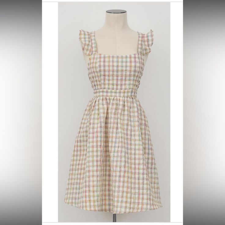 Lili Sidonio Nwt Woven Plaid Dress Cream/ Beige Colored Dress Pink And Blue Design Ruffled Straps Back Zipper With Hook And Eye Clasp Llined From Waist Down Size Small Spring Gingham A-line Dress, Fitted Gingham Dress For Garden Party, Gingham Square Neck Sundress, Spring Gingham Dresses Lined, Spring Gingham Lined Dress, Pastel Fitted Mini Dress, Fitted Pastel Mini Dress, Multicolor Sundress For Picnic, Feminine Cotton Dress For Picnic