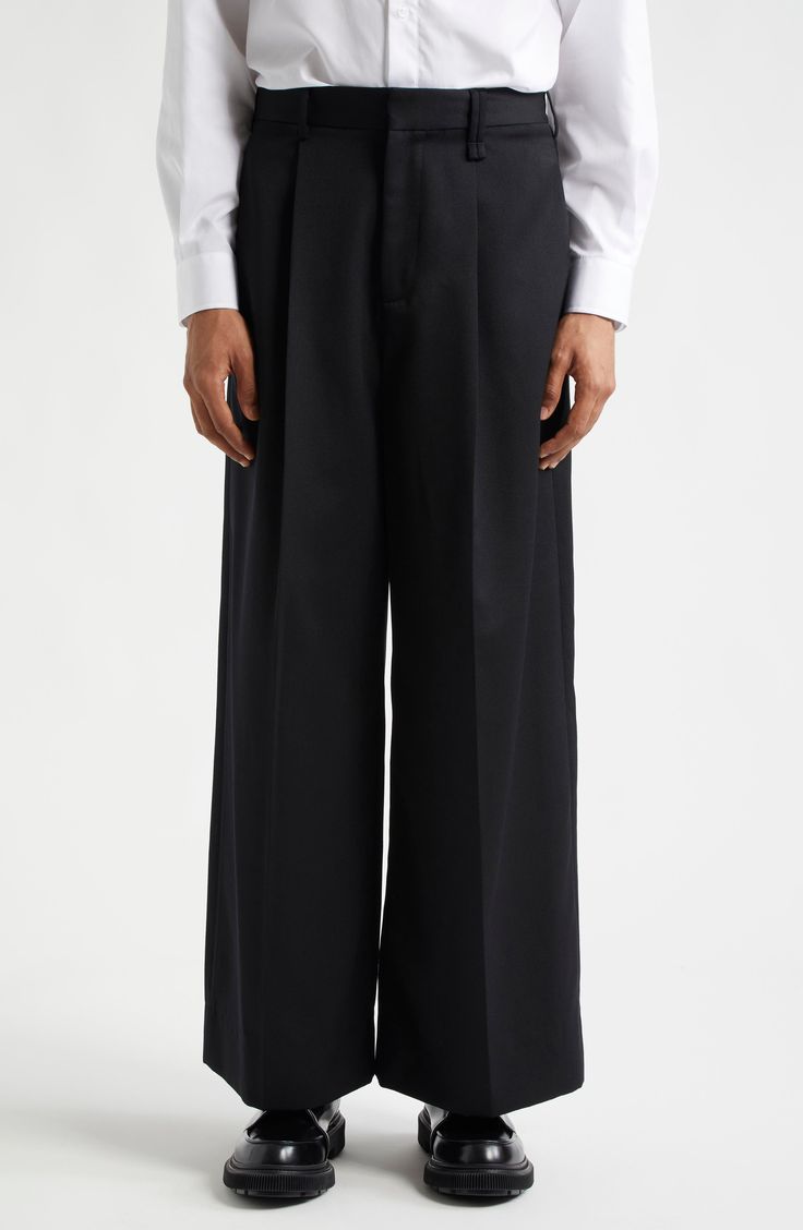 A hint of virgin wool softens clean-lined trousers that are tailored with crisp pleats. 30 1/2" inseam; 29" leg opening; 14" front rise; 16 1/2" back rise (size Medium) Zip fly with hook-and-bar closure Lined 55% polyester, 45% virgin wool Dry clean Made in Portugal Designer Clothing Asian & Pacific Islander Owned/Founded Pacific Islander, Fabric Gift Bags, Nordstrom Store, Fabric Gifts, Free Fabric, Anniversary Sale, Black Fits, Wide Leg Trousers, Designer Clothing