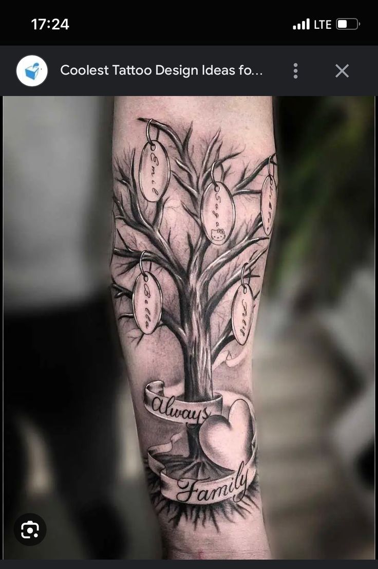 a family tree tattoo on the arm with hearts around it and an inscription that says, always family