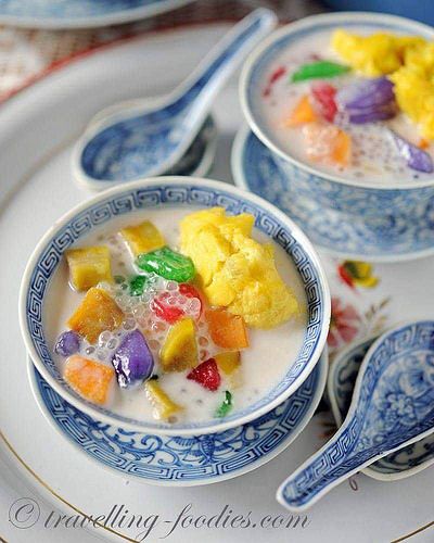 two bowls filled with cereal on top of a white plate