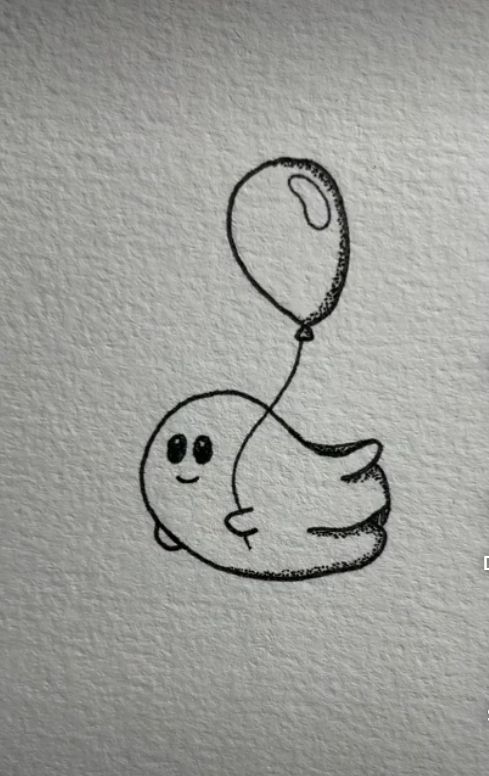 a drawing of a balloon flying through the air with a smiley face drawn on it